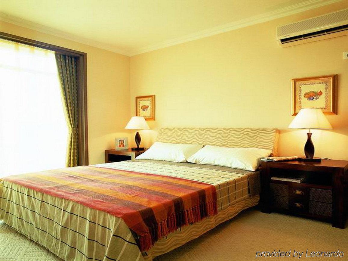 Beijing Jinqiao Apartment Hotel Номер фото